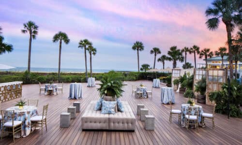 Tall palms against a blue and purple sky from the outdoor deck of the Westin Hilton Head, SC