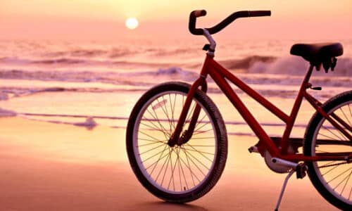 Red bicycle on the beach at sunset at the Westin Hilton Head, SC.